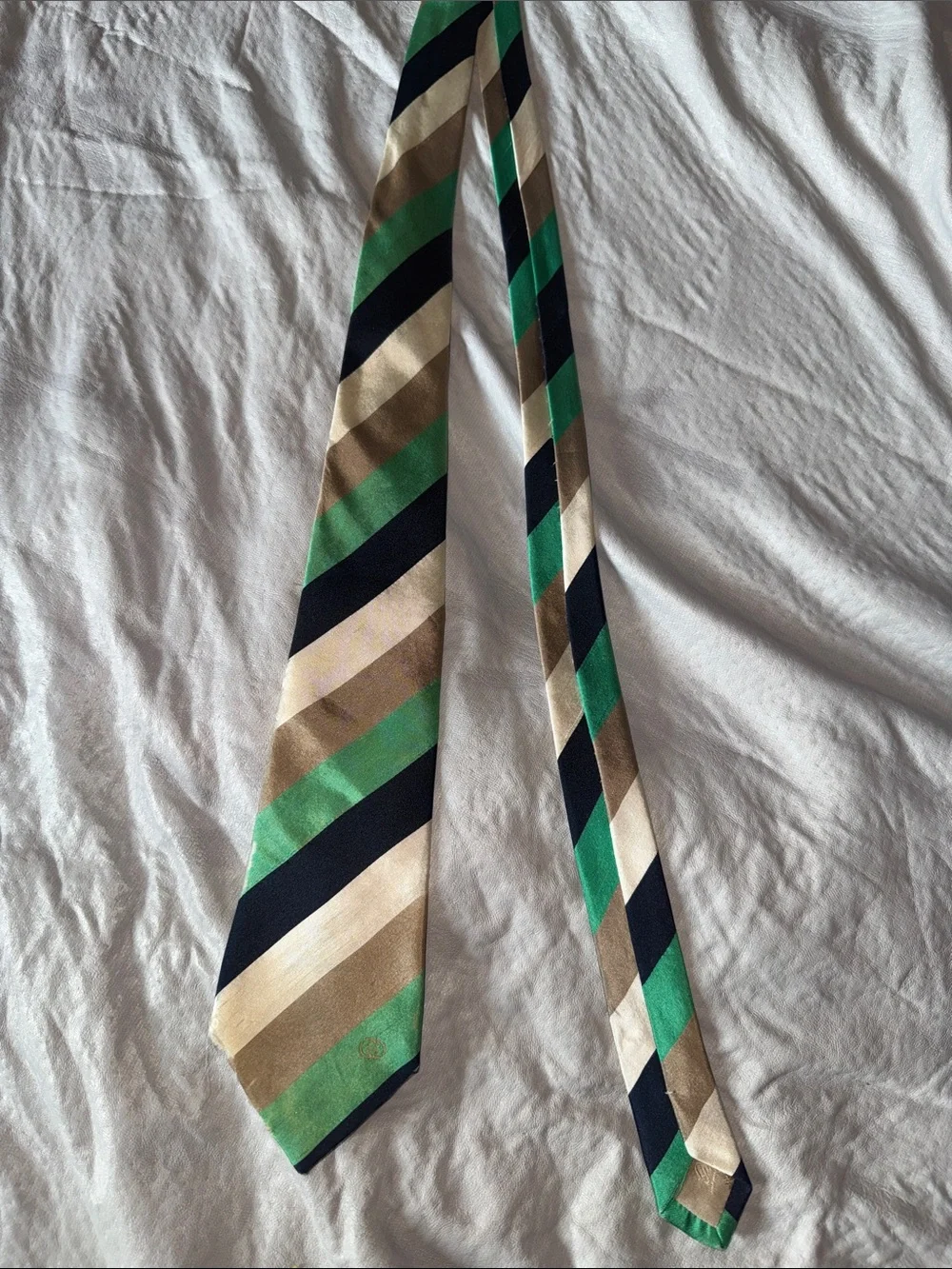 Vintage Gucci tie. Has frayed ends but overall clean and in good condition.